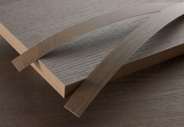 RealGrain Knokke system including wall panel, 1mm laminate, and edge banding.